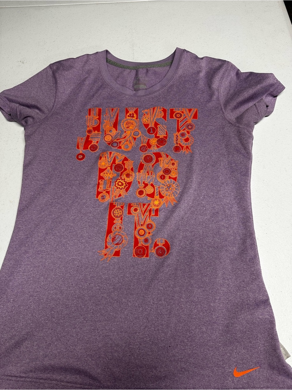 Nike Purple Short-Sleeve Graphic Tee with Orange Print